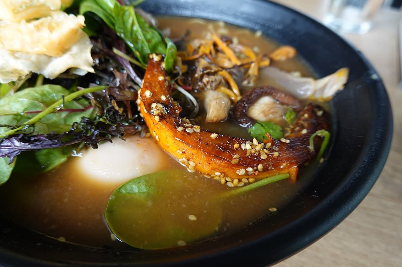 Tokyo Vegan Ramen Center — Creamy sesame-tahini broth ramen with soy meat and raw vegetables